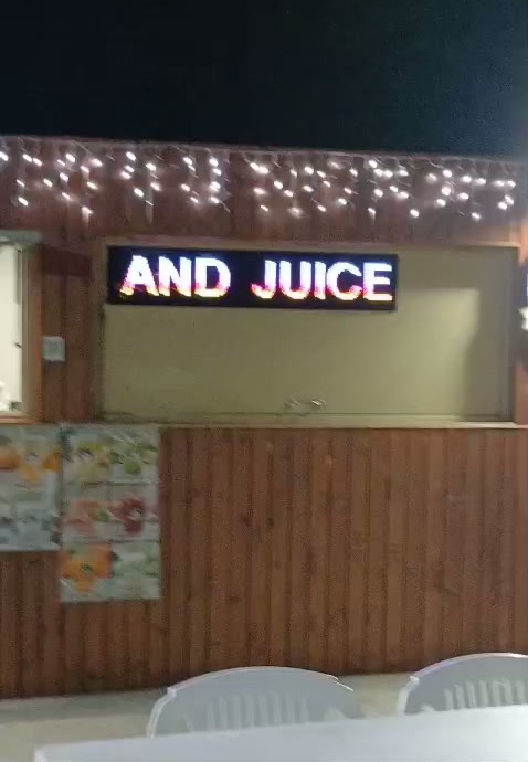 Najcos LED window sign installed at Frozzie Pizza and Juice Bar in Coolaroo